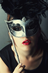 beautiful young girl with venetian mask