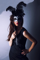 beautiful young girl with venetian mask