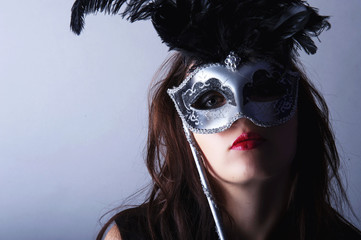 beautiful young girl with venetian mask