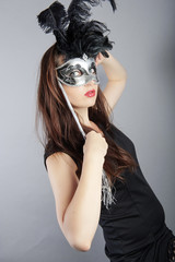 beautiful young girl with venetian mask