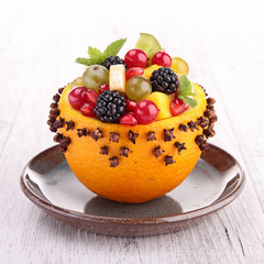 fruit salad in orange bowl