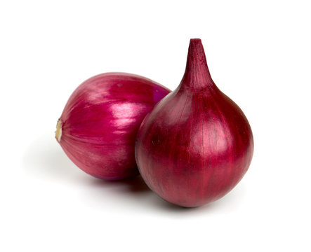 red onion bulbs isolated on white