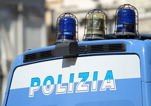 gleaming Italian police van with lights
