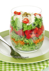 Tasty salad with fresh vegetables, isolated on white