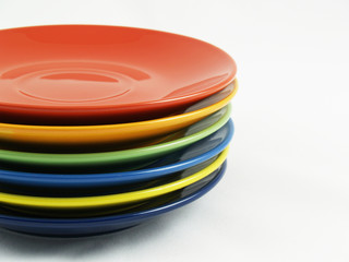Collection of colorful dishes on the white background