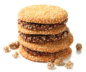 Homemade cookies with sesame seeds, isolated on white
