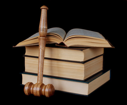 Gavel And Stack Of Thick Old Books