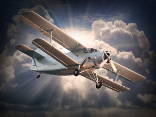 Retro style picture of the biplane. Transportation theme. © Kletr