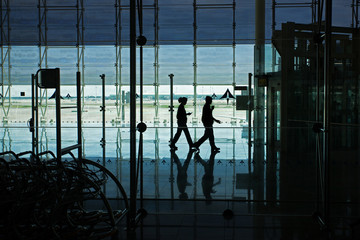 People walk down the hall Airport