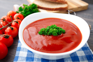 Tasty tomato soup with herbs