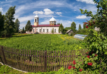 Fototapeta na wymiar Christian orthodox church in Novgorod region, Russia. Fisheye