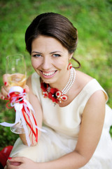 Beautiful bride with a glass of champagne