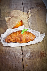 fresh baked croissants with apricot jam