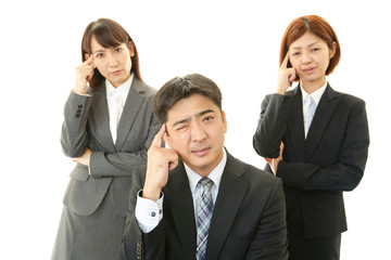 苦悩するビジネスマンとOL