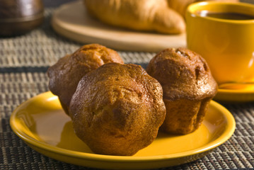Fototapeta na wymiar Tasty muffins, coffee and croissant