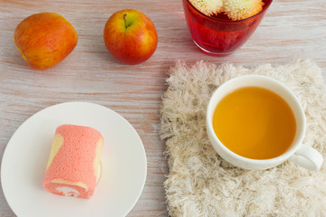 teapot with cup of tea