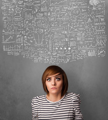 Young woman gesturing with sketched charts above her head