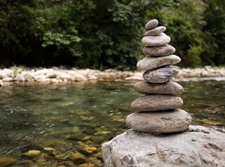 Stack of stones, pebbles,balanced by river