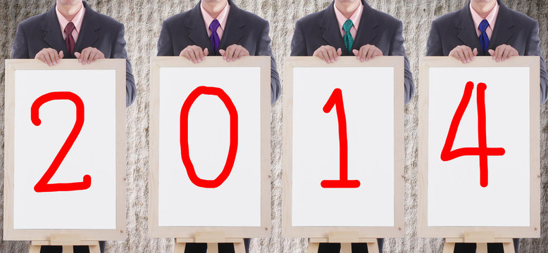 businessman show 2014 numberic for weclome to new year