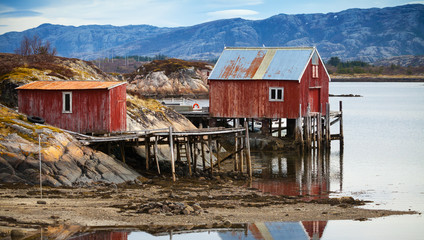 Coastal Norwegian red wooden barn and houses