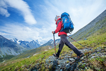 Fototapeta premium Hiker near Belukha Mountain, the highest in Siberia