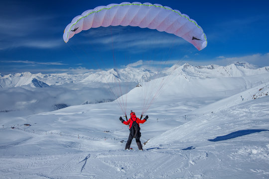Sky gliding in snowy Caucasus mountains