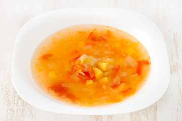 vegetable soup in white plate