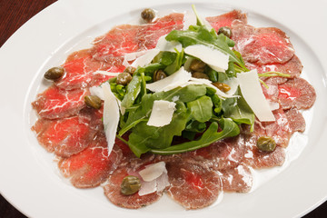 Obraz premium Meat Carpaccio with Parmesan Cheese