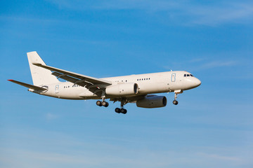white jet passenger aircraft