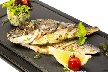 sea fish cooked on the grill