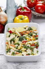 Macaroni with vegetables. Popular italian dish