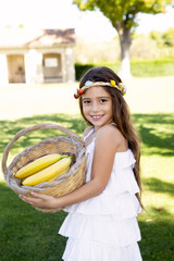 Fototapeta premium Bambina allegra con le banane