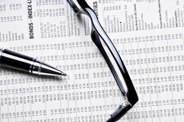 top of view of glasses and business pen