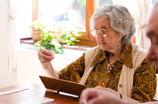 Senior people playing rummy