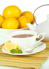 Cup of tea with lemon close-up