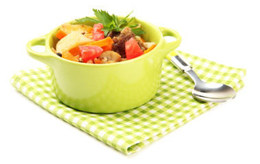 Homemade beef stir fry with vegetables in color pan, isolated