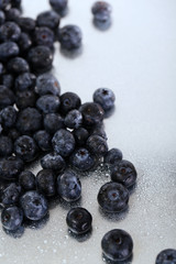 Blueberries on metal background