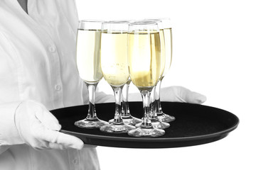 Waitresses holding tray with glasses of champagne, isolated