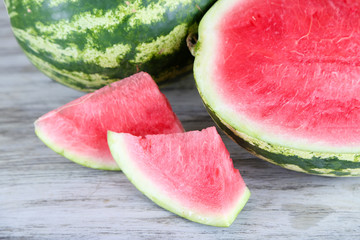 Ripe watermelons on wooden table