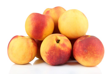 Ripe sweet peaches, isolated on white