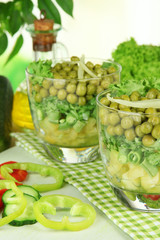 Naklejka na ściany i meble Tasty salad with fresh vegetables on wooden table
