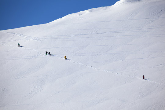 People climbing to the slope