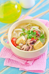 soup with noodles and seafood