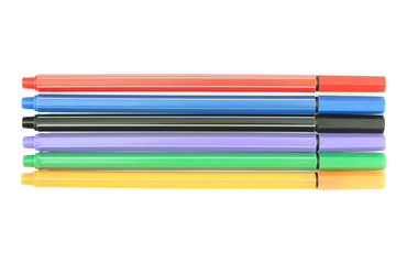 Fototapeta premium Multicolored markers on white background