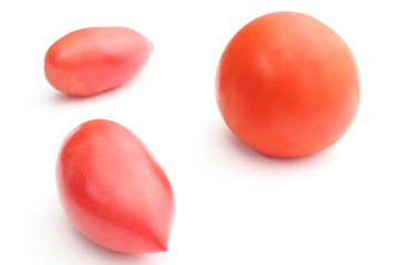 Three fresh tomatoes on white background