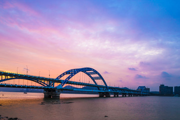 Fototapeta na wymiar night bridge with sunset