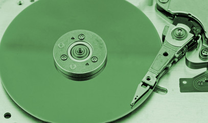 Open computer hard drive on white background