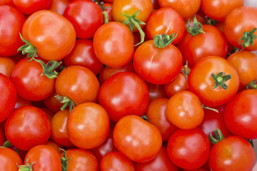background of red ripe tomatoes