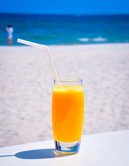 drinking a fresh lemonade on a beach