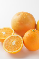 orange and a grapefruit